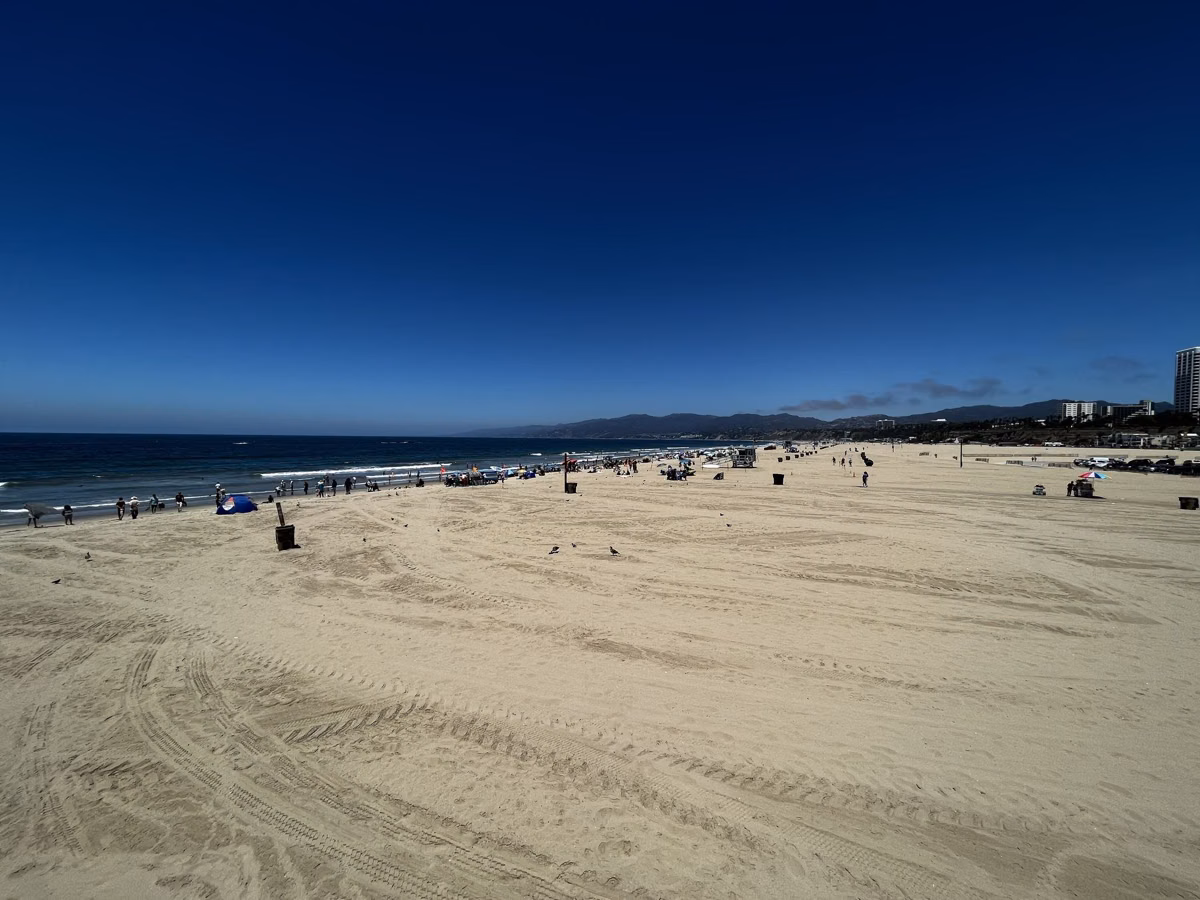 A quiet stretch of wide sand at Santa Monica State Beach