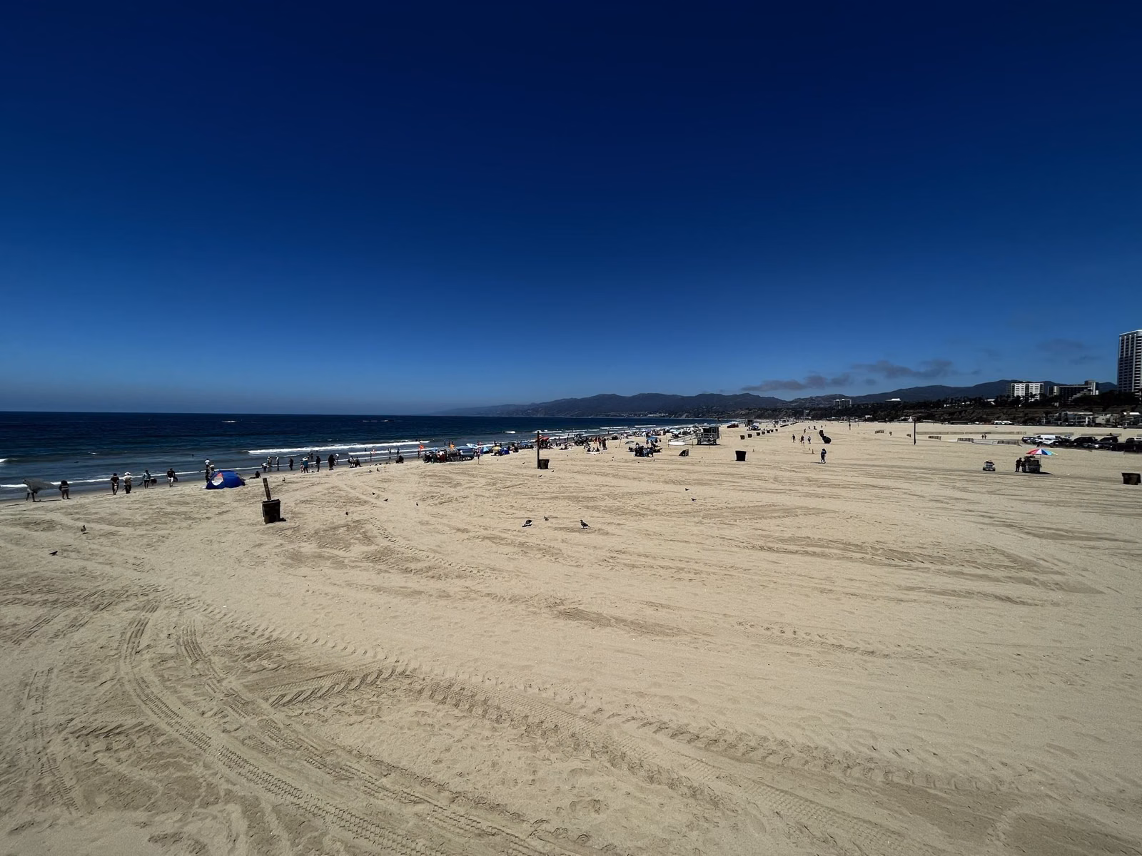 A quiet stretch of wide sand at Santa Monica State Beach