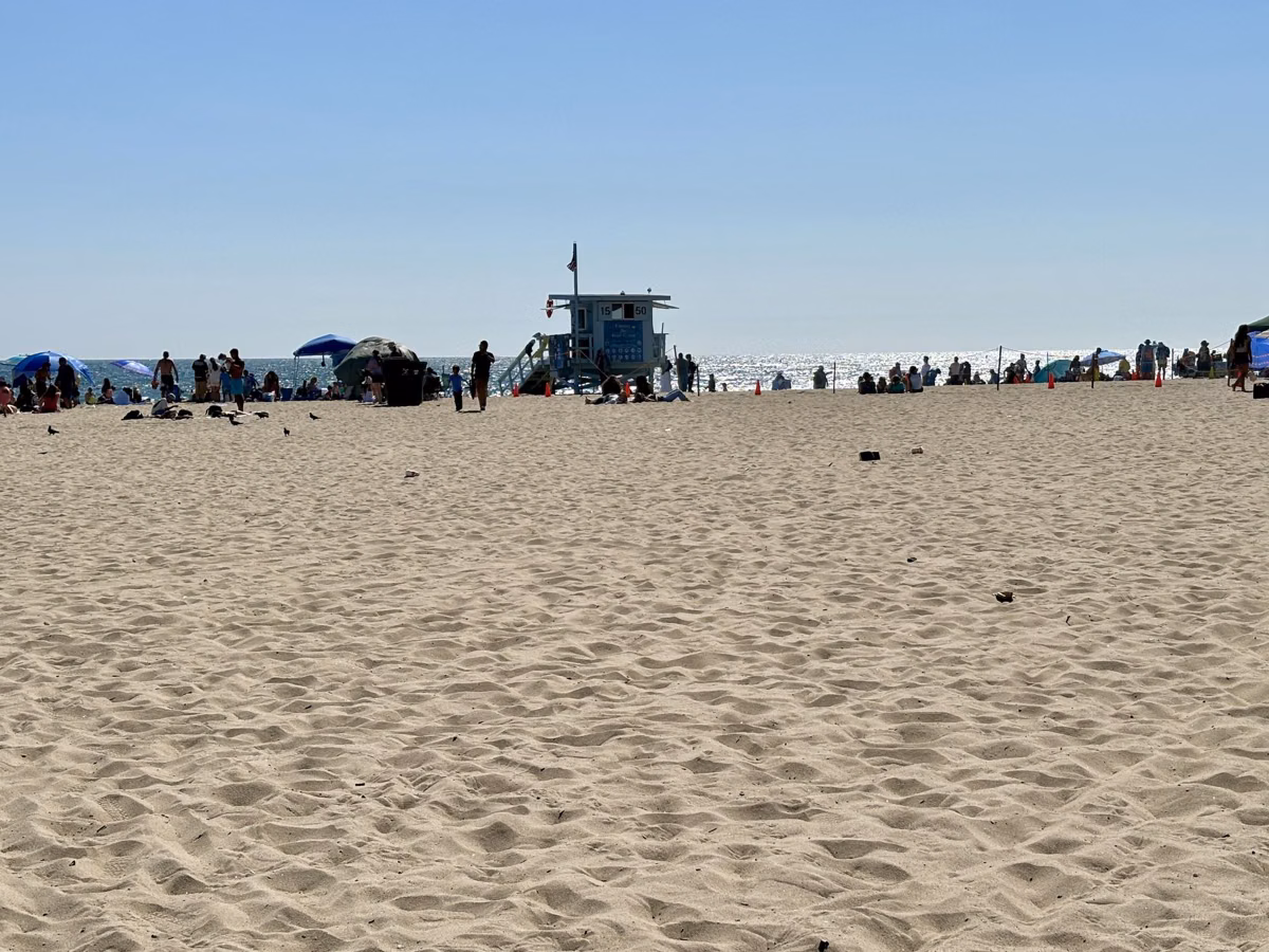 Wide sand and a lifeguard tower on Santa Monica State Beach